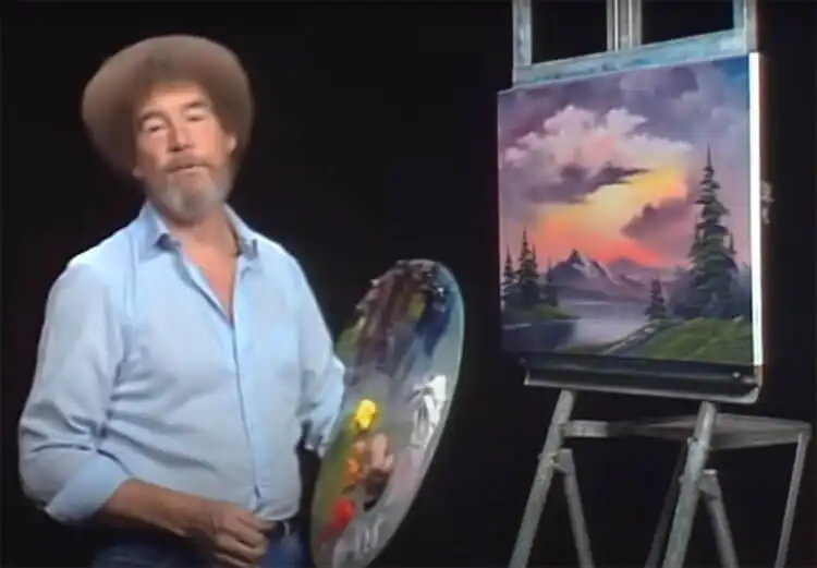 10 Bob Ross Paintings for Beginners 9 Bob Ross 'Sunset Aglow' painting featuring a colorful sunset over mountains and a lake.