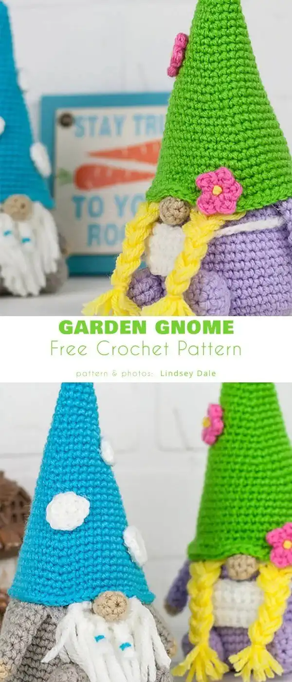 A pair of garden gnomes, male and female, with matching hats and outfits, posed together among greenery.