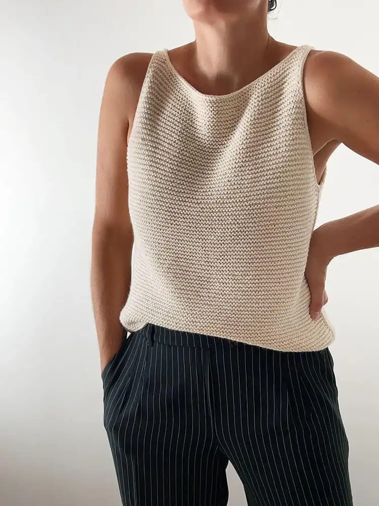 A sleeveless Soho Top with a boatneck neckline, demonstrating its top-down construction and customizable length.