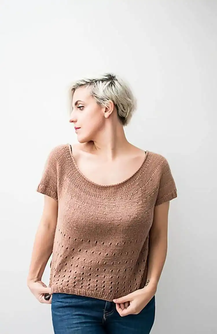 A Love Pecan Top featuring a simple yet elegant circular yoke construction, perfect for advanced beginner knitters.