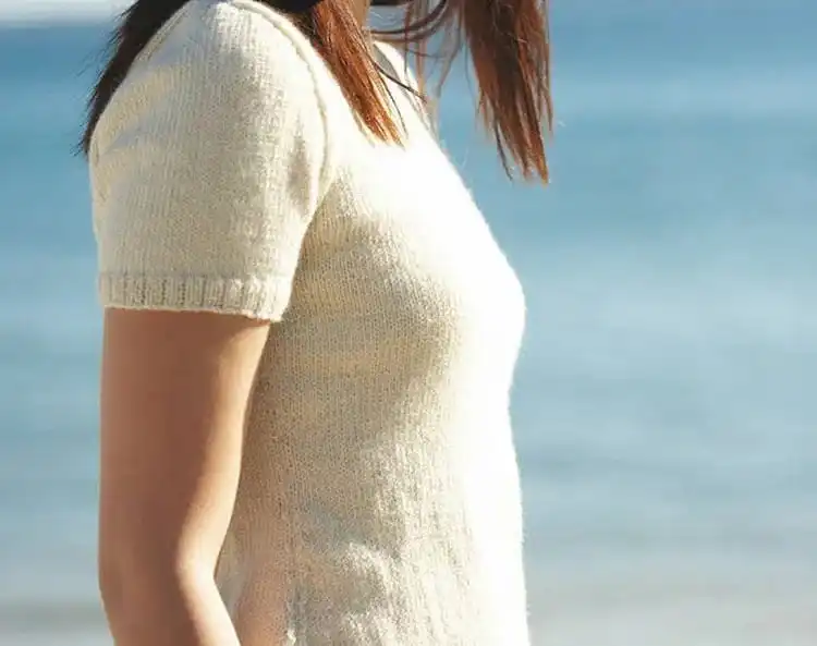 A brightly colored Easy Summer Top Tee, showcasing its lightweight knit and airy texture, ideal for warm weather.