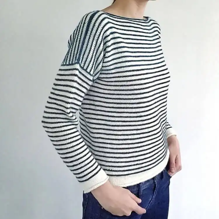 A Striped Spring Shirt displaying cheerful stripe patterns and a light, breathable fabric, perfect for spring and summer.