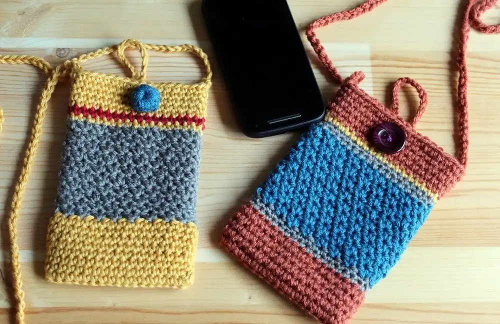 Sleek Crochet Phone Sling Bag in a minimalist design, holding a smartphone