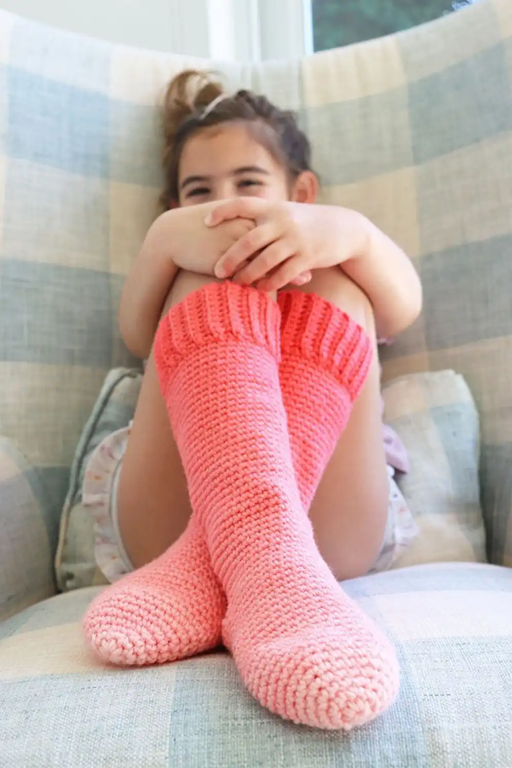 Ombre crochet slippers showcasing a gradual color transition from light to dark.