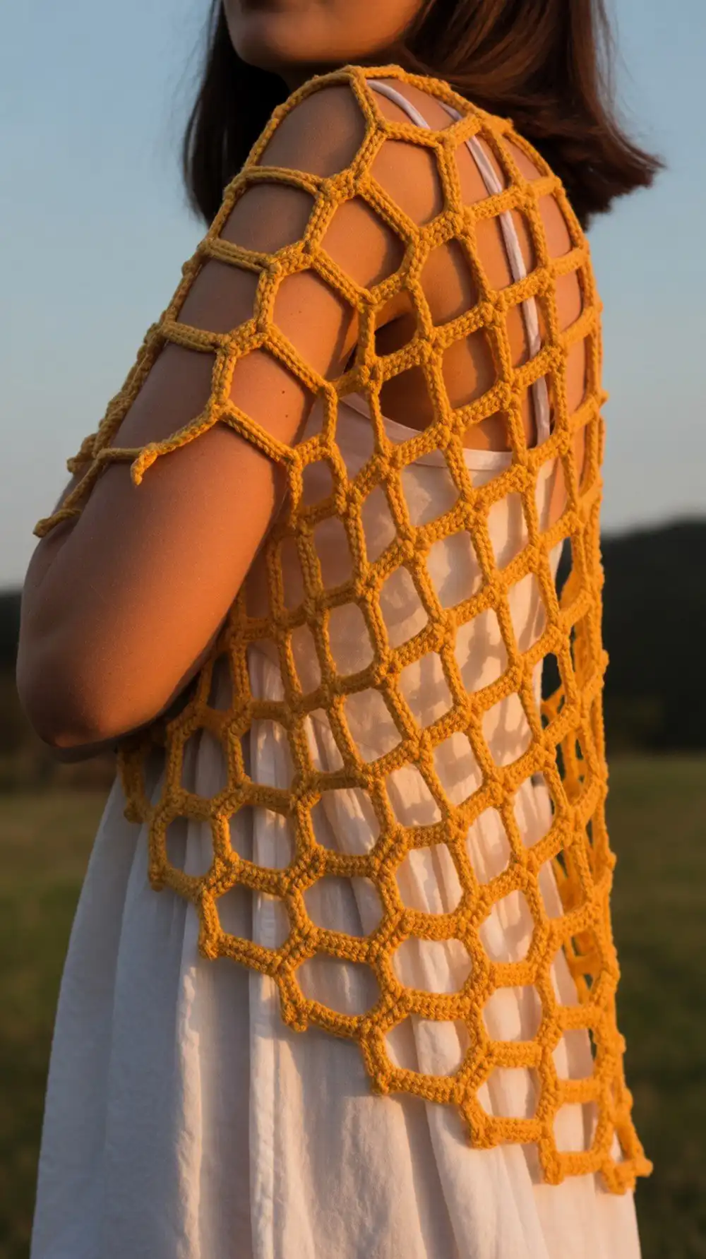 14 Crochet Mesh-Lace Summer Shrug Ideas 12 Bring Me the Sun Shrug, an eye-catching design starting as a V-stitch circle and morphing into a square then rectangle.