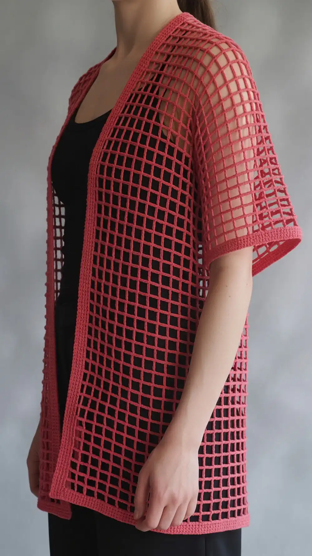 14 Crochet Mesh-Lace Summer Shrug Ideas 5 Classic Red Heart Mesh Shrug crocheted with simple filet mesh, shown in a vibrant pink for summer.