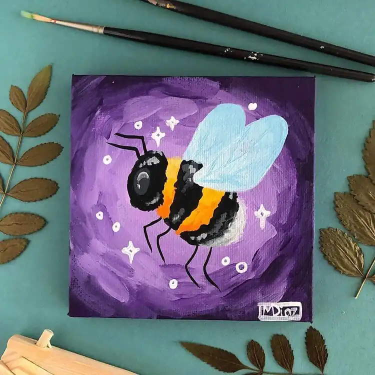 Beginner acrylic bee painting on canvas with fuzzy texture and bright flowers.