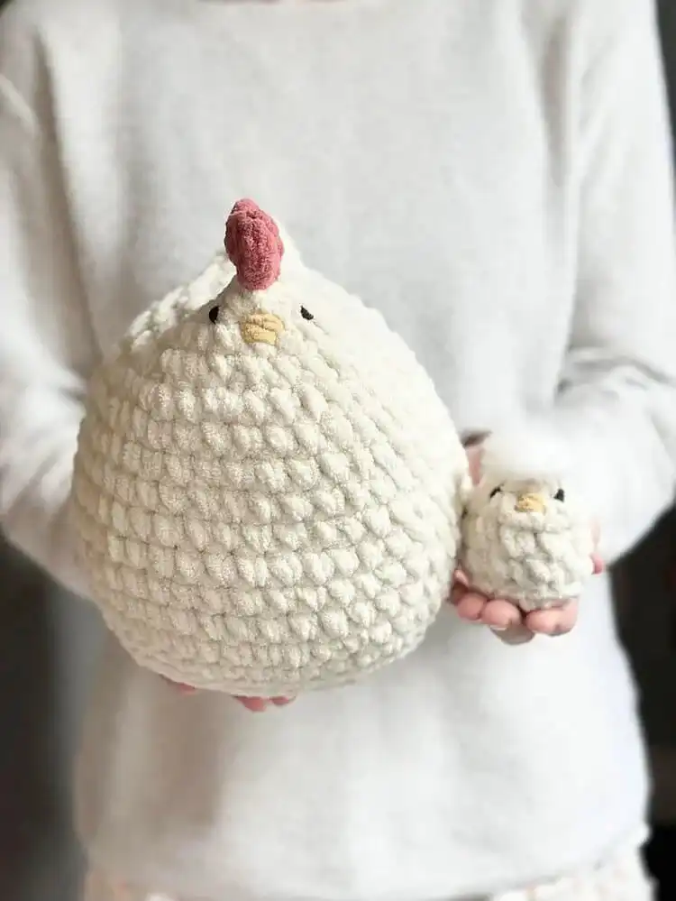 A Mama and Mini Mabel Chicken set, featuring a large hen and her tiny chick, perfect for a cozy display.