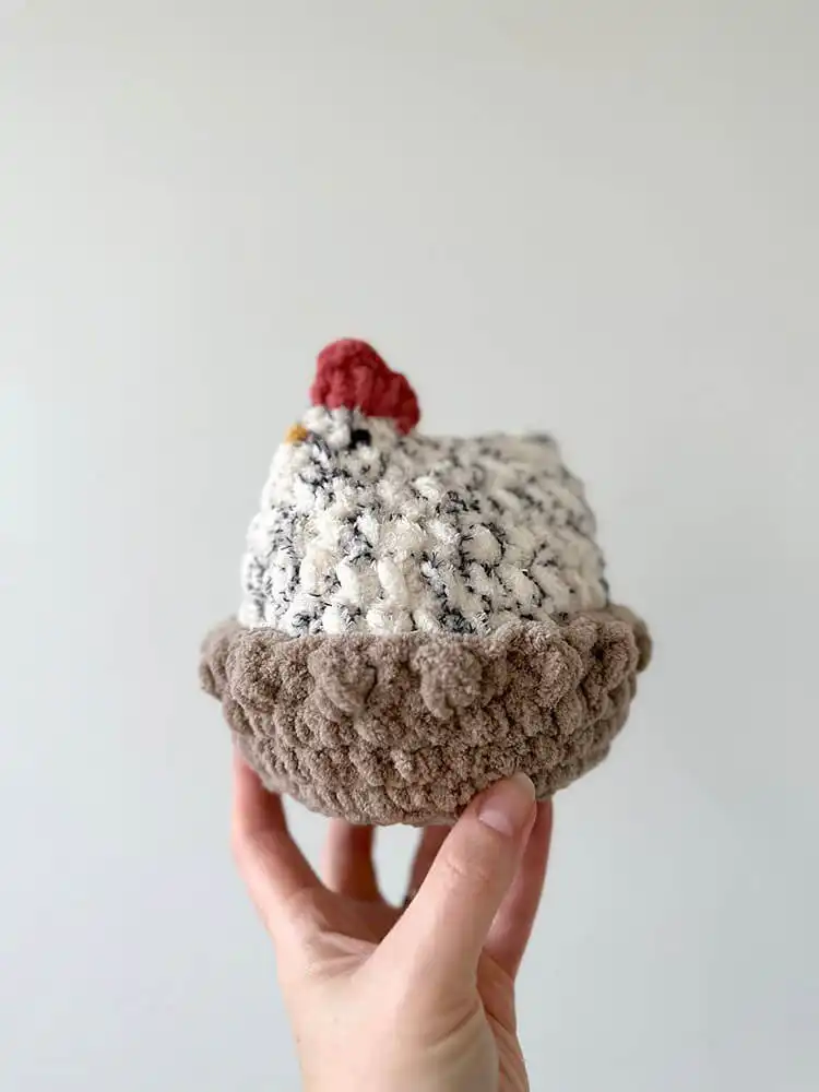 A simple yet elegant Crochet Nest pattern, ideal for holding crocheted eggs or chickens as a centerpiece.