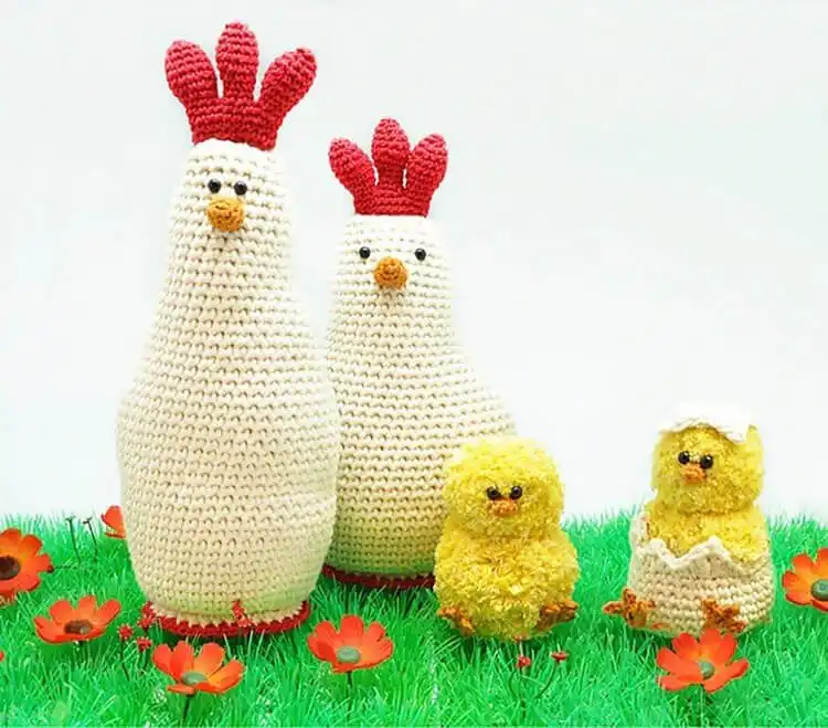 A complete Crochet Chicken Family, featuring adult chickens and their adorable offspring, customizable for personal touch.