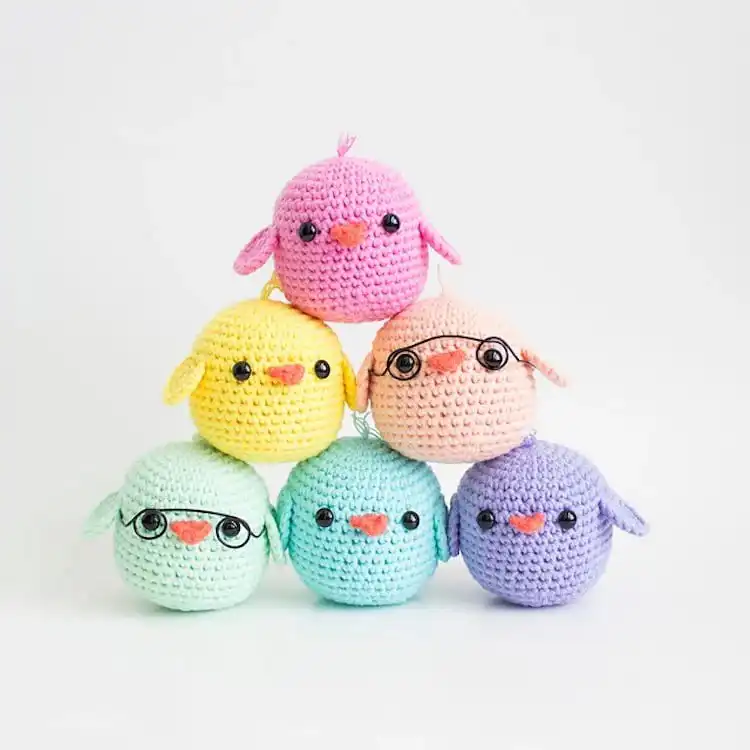 An adorable Amigurumi Chick, small, yellow, and too cute to resist, ideal for beginners.