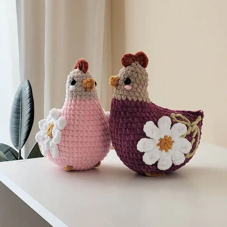 A beautifully detailed Floral Chicken crochet design, adorned with delicate crocheted flowers.