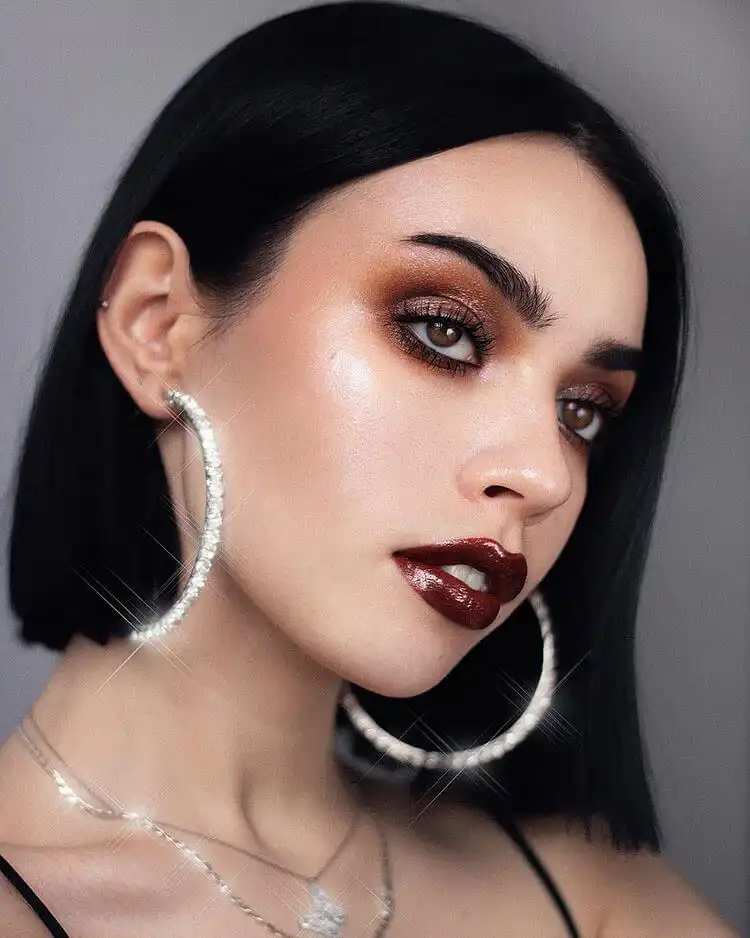 15 Halloween Makeup Ideas for Women - Easy Deer Makeup 13 Lips adorned with black lipstick, a powerful and versatile choice for gothic or witchy Halloween looks.