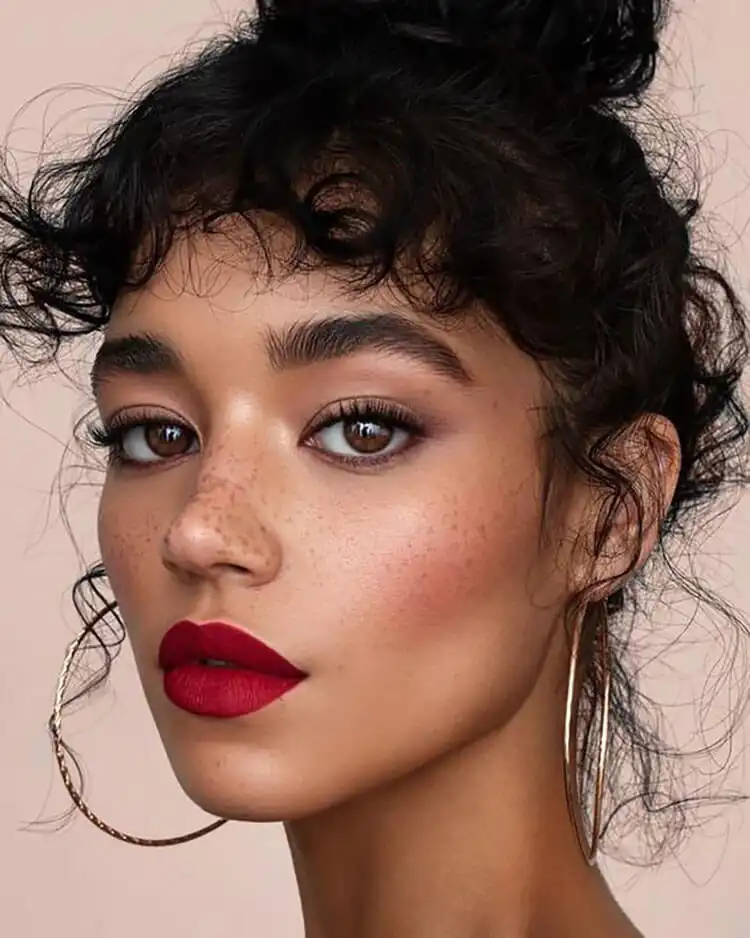 15 Halloween Makeup Ideas for Women - Easy Deer Makeup 4 Face showing sculpted bronze cheeks with a shimmery finish, contributing to a glowing Halloween complexion.