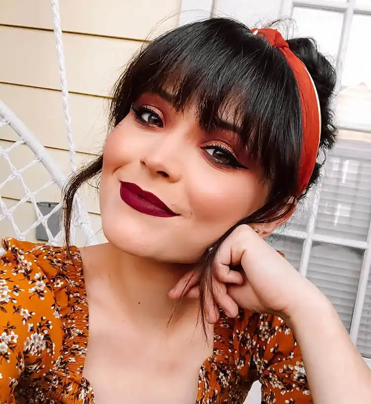 15 Halloween Makeup Ideas for Women - Easy Deer Makeup 5 Close-up of lips with vibrant red lipstick, a bold and classic choice for Halloween characters like vampires.