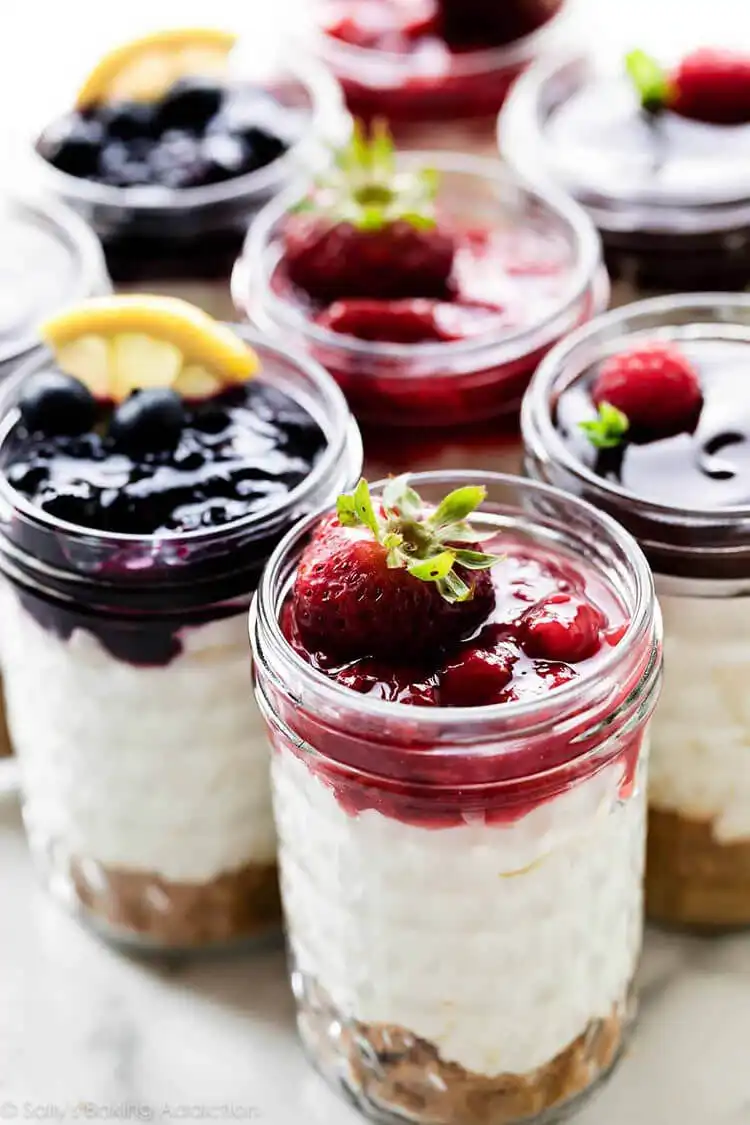 No-Bake Cheesecake Jars, creamy and easy, topped with fresh mixed berries.