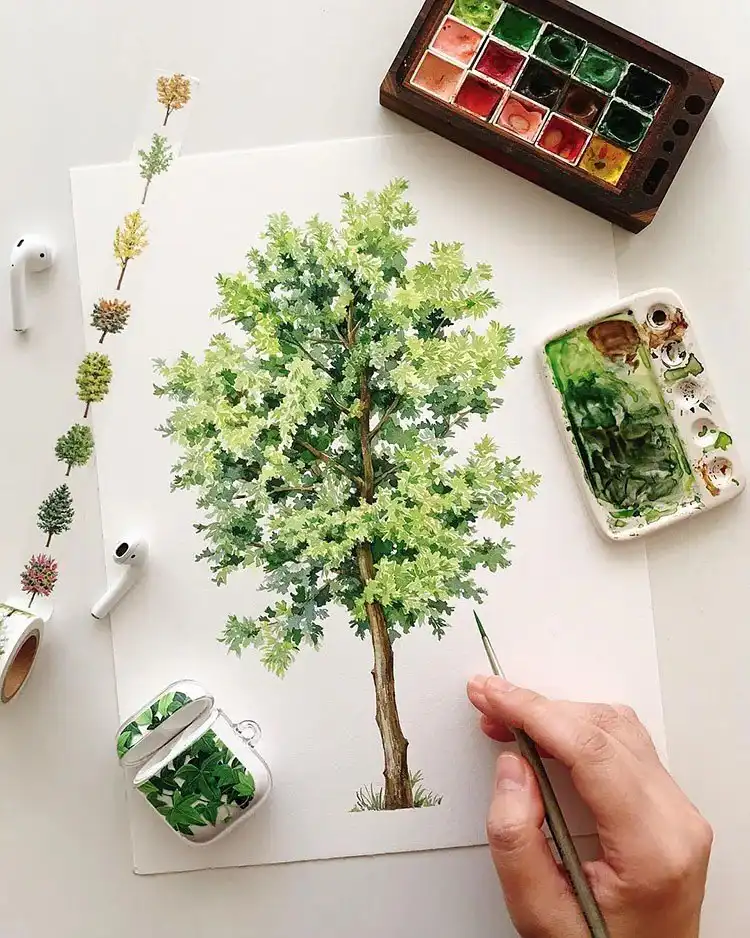 Detailed watercolor painting of an oak tree with layered green foliage and textured brown bark, suitable for beginner artists.