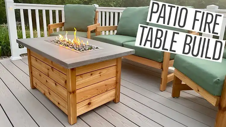 Luxurious DIY Fire Pit Table Build, a custom wooden table with a rectangular gas fire pit insert in the center, surrounded by modern outdoor furniture.