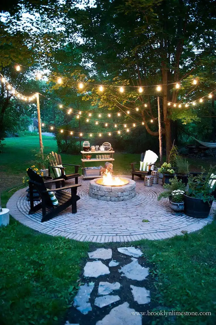 Expansive DIY Circular Outdoor Entertaining Space, featuring a central fire pit surrounded by a perfectly laid circular paver patio with seating.