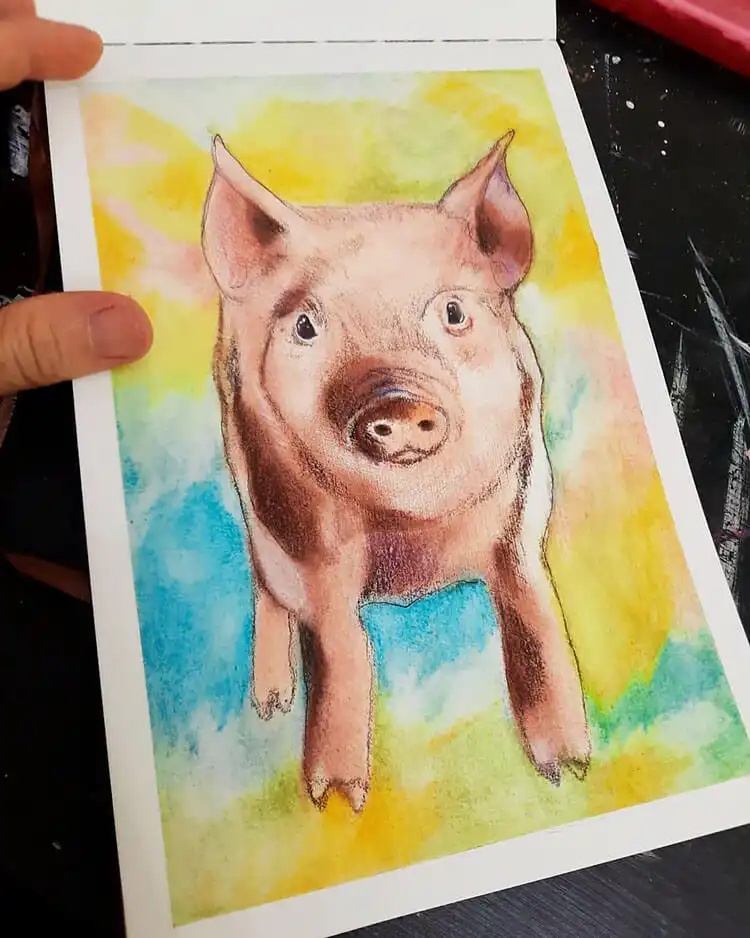 Painting of a pig using watercolor, acrylics, or pastels, showcasing various art mediums.