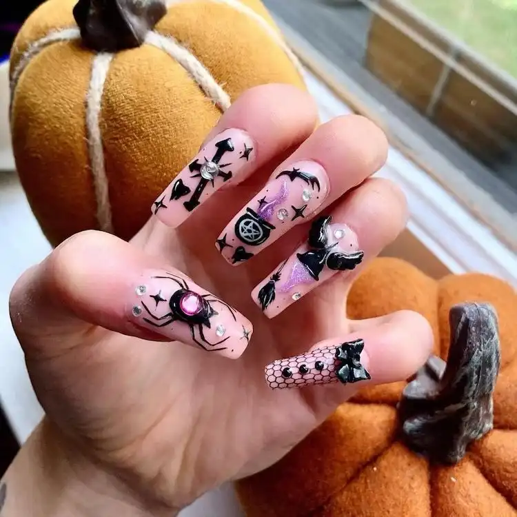 Playful pink and black spooky Halloween nails with bat and spider doodles, one of 16 Extraordinary Pink And Black Nail Design Ideas - French Tip Square Acrylic Nails