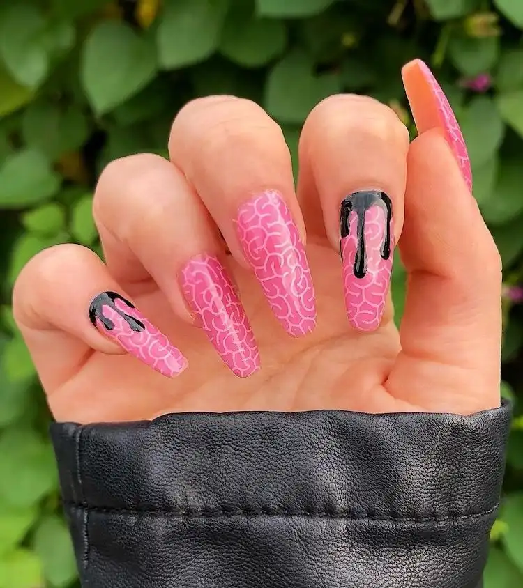 Unique spooky pink and black nail art using stamping techniques, from 16 Extraordinary Pink And Black Nail Design Ideas - French Tip Square Acrylic Nails