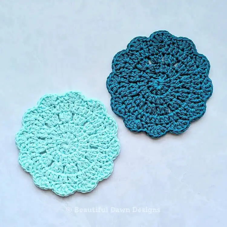 Brightly colored crochet coaster with a sunburst or flower design