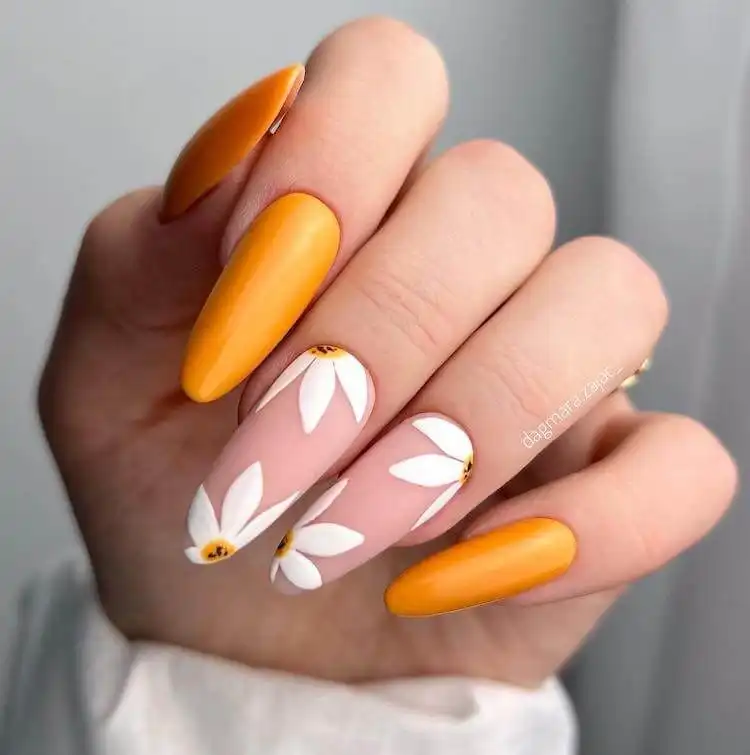 18 Simple Orange Nail Designs - Heart Nails 15 Long acrylic orange nails featuring charming hand-painted white daisy flowers.