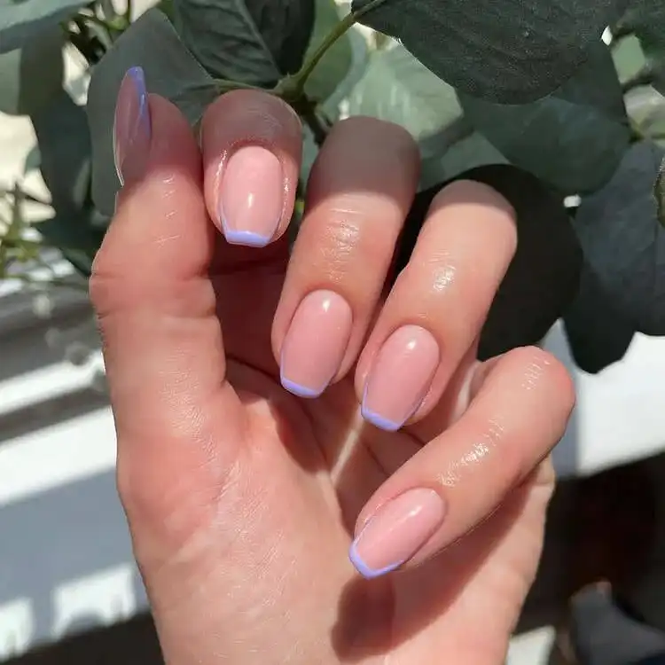 Striking short coffin nails with a black base and vibrant colorful glitter sparkles, complemented by solid pink elements for a dramatic effect.