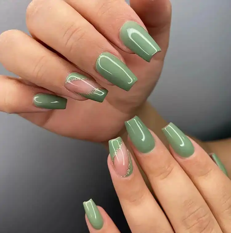 Festive short coffin nails with a colorful confetti or sprinkle-like dot pattern.