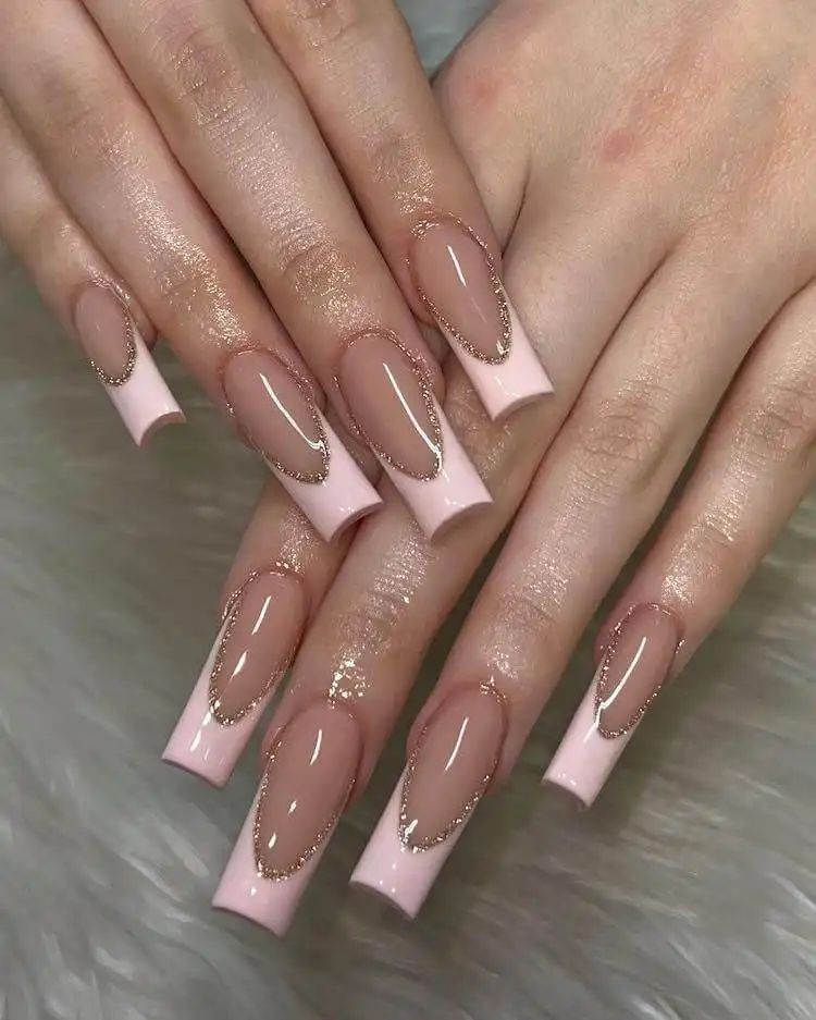 Pastel tapered square nails with charming flowers placed near the cuff area.