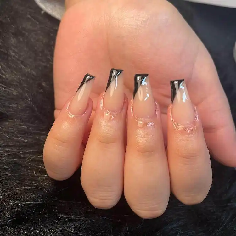 Long and elegant tapered square nails in a single color with a subtle glitter line.