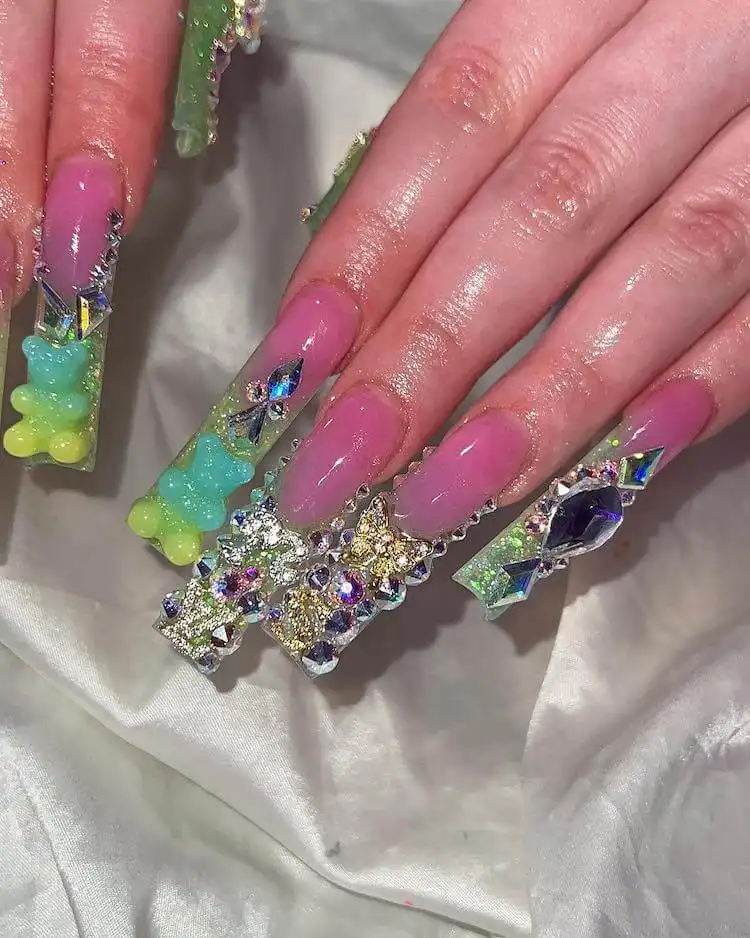Classic French tips on tapered square nails lined with coordinating glitter.