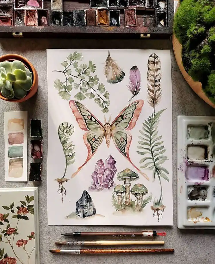 Whimsical watercolor butterfly with feathers, mushrooms, and unique natural elements.