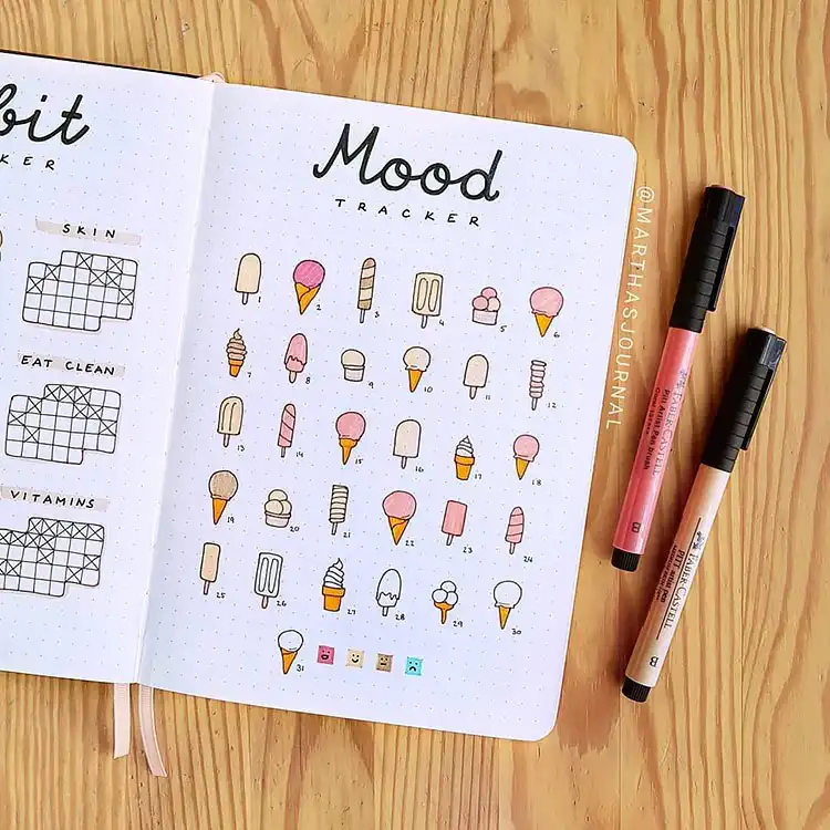 Summer-themed bullet journal mood tracker with various seashells, each colored to reflect daily emotional states.