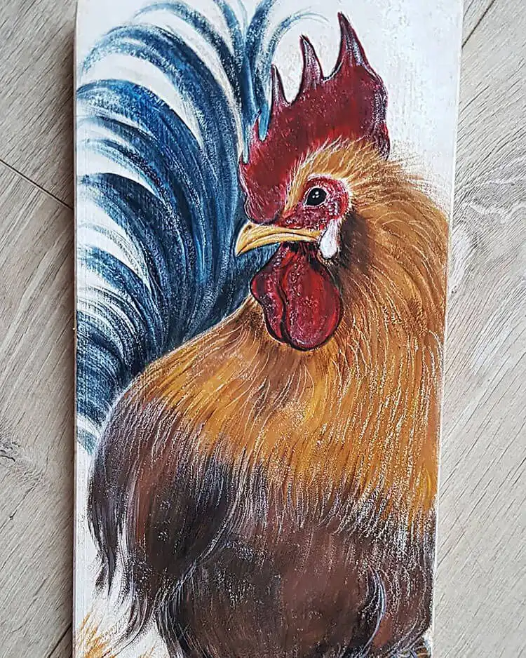 An acrylic painting of a chicken, showcasing rich textures and vibrant color application.