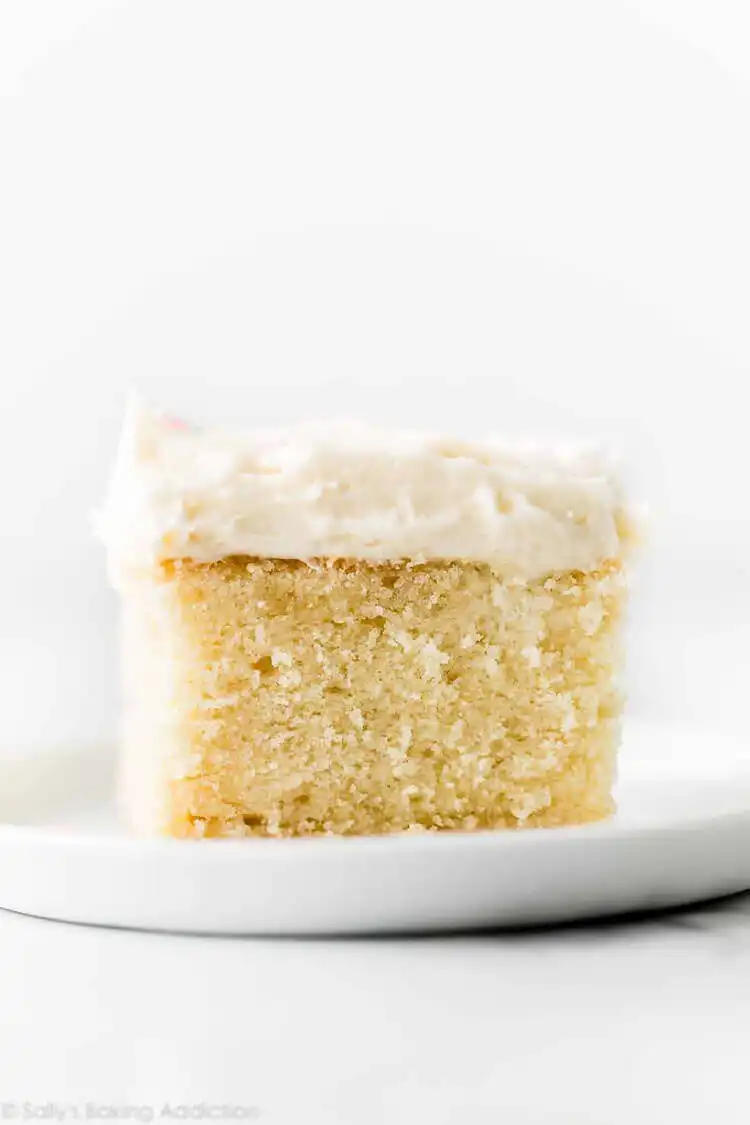 Vanilla sheet cake with fluffy whipped buttercream frosting