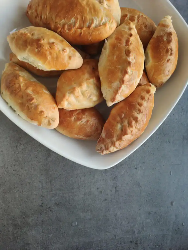 Classic squirrel pie with a golden, flaky pastry crust, ready to be served, a savory game pie