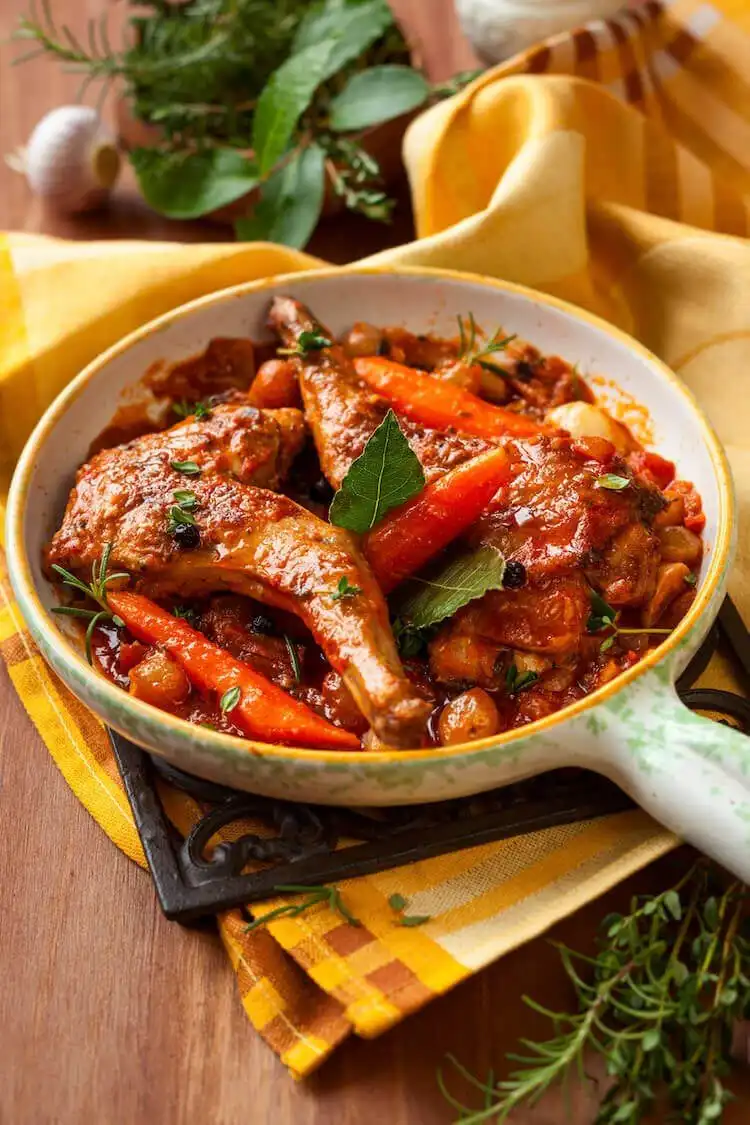 Rich slow-cooked squirrel and chorizo stew with root vegetables, a robust squirrel dish