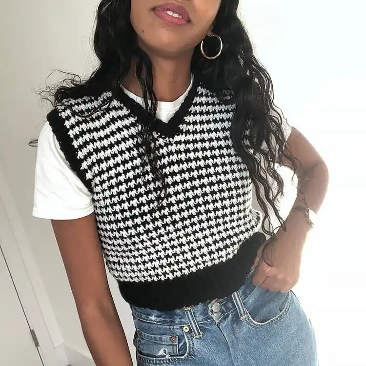 A sophisticated Houndstooth Vest in contrasting colors, demonstrating the intricate stitch pattern.