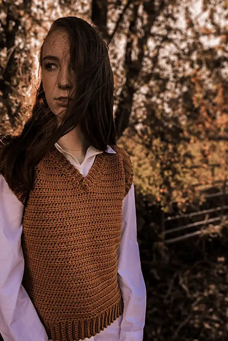 A warm, vintage-style Grandpa Sweater Vest in earthy tones, perfect for fall layering.