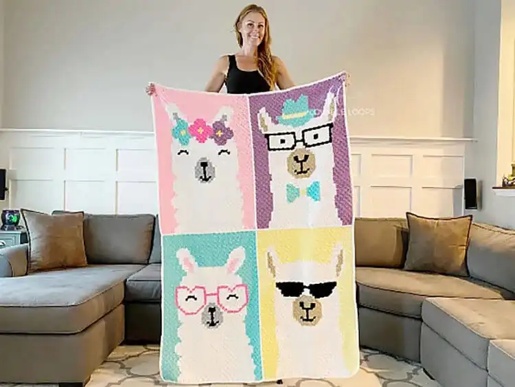 A lightweight Spring into Summer Blanket in delicate pastel shades and intricate C2C work.