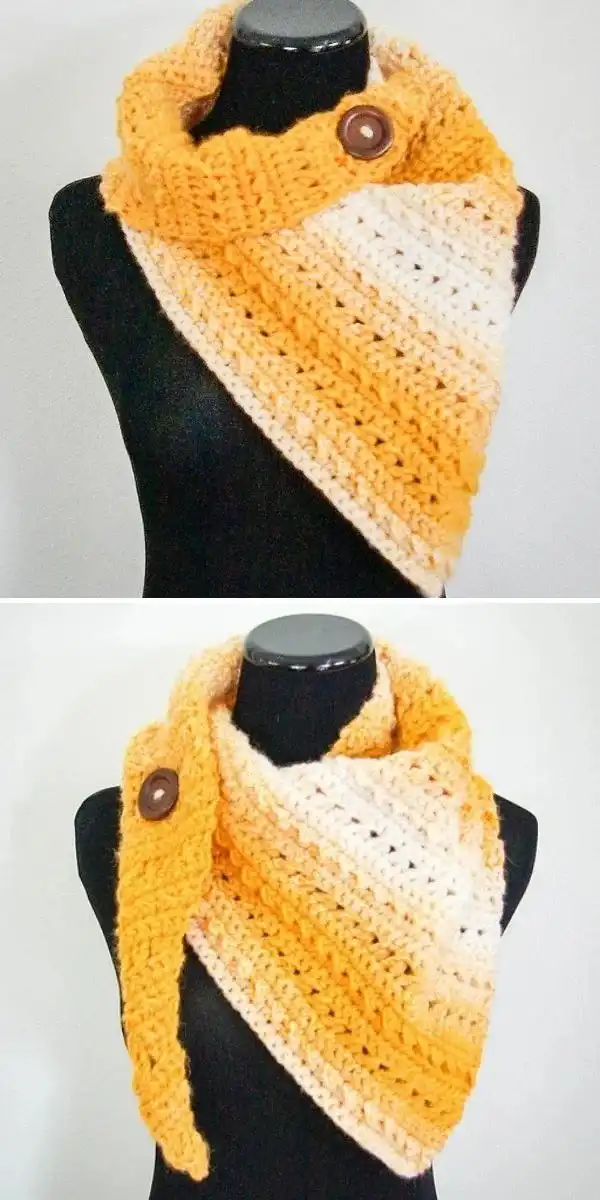 A crochet scarf featuring ombre yarn transitioning from orange to white, styled as a cowl, for the Winter Rays Scarf.