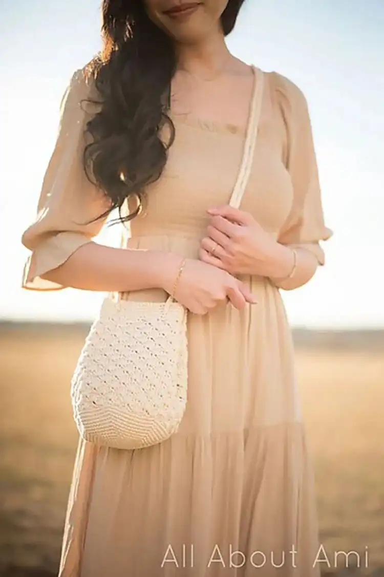 Rosette Drawstring Bag in a soft color with elegant shell stitch
