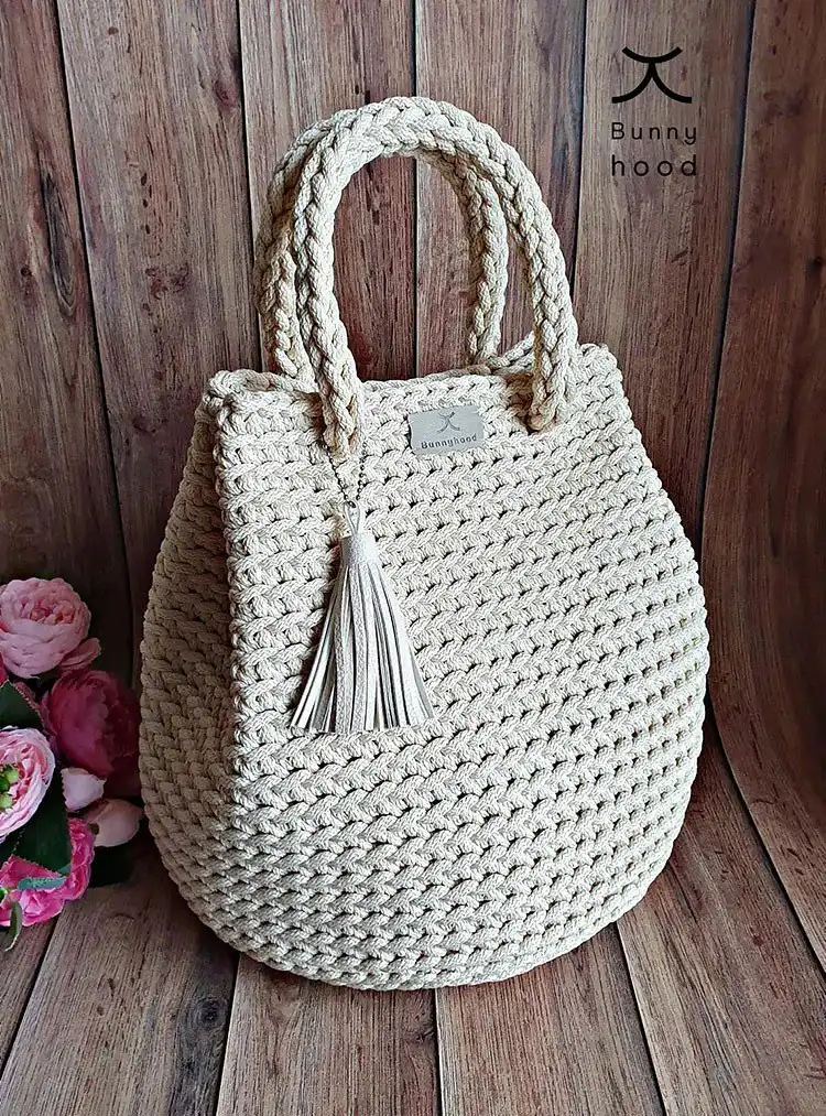 Dew Drop Handbag with its unique, elegant, teardrop shape