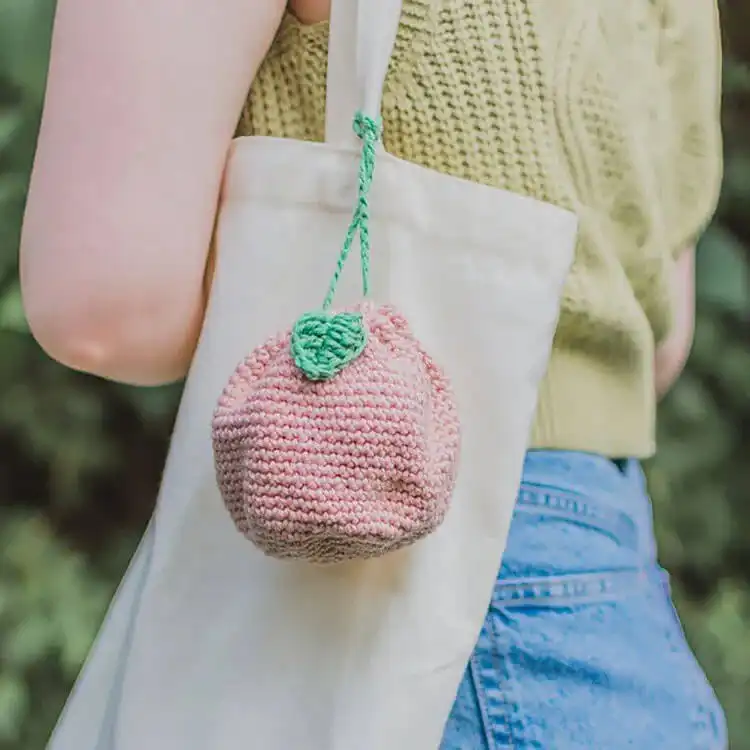 Cute Fruit Drawstring Pouch, shaped like a strawberry or orange