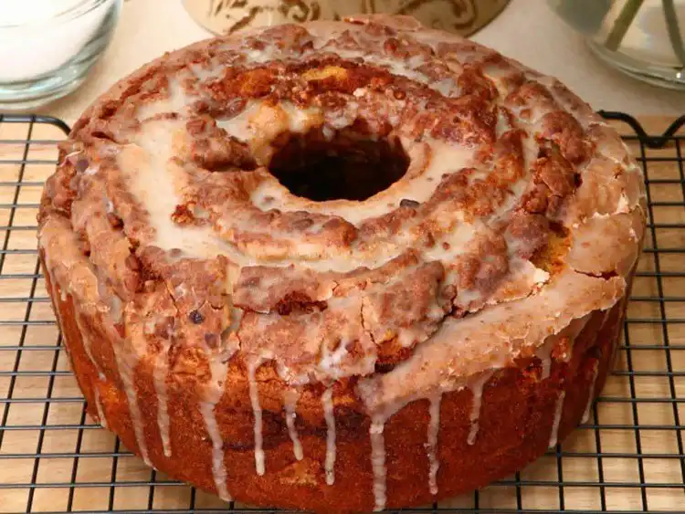 A classic sock it to me cake, showing its signature swirl of pecans and cinnamon.