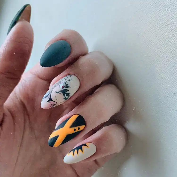 23 Anime Nail Designs to Show Your Love for Anime and Manga - Jujutsu Kaisen Sukuna 2 Dark aesthetic Jujutsu Kaisen themed nails with cursed energy symbols and character motifs.