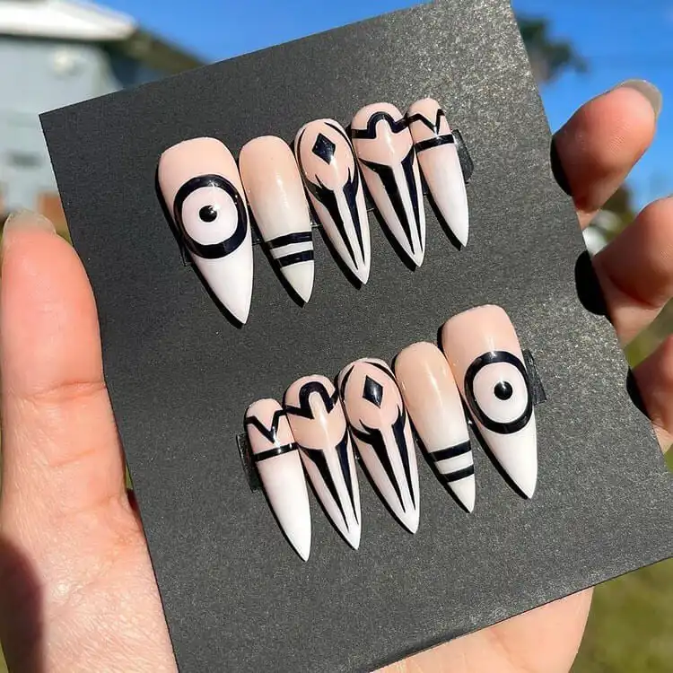 23 Anime Nail Designs to Show Your Love for Anime and Manga - Jujutsu Kaisen Sukuna 15 Vibrant Hunter x Hunter nails featuring main characters like Gon and Killua, along with Nen symbols.