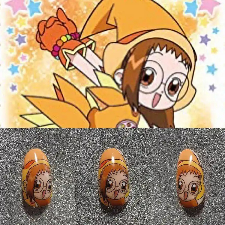 23 Anime Nail Designs to Show Your Love for Anime and Manga - Jujutsu Kaisen Sukuna 16 Aggressive stiletto Sukuna nails from Jujutsu Kaisen, showcasing his powerful markings and cursed energy.